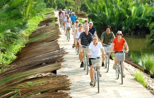 Foreign tourist ride bicycle